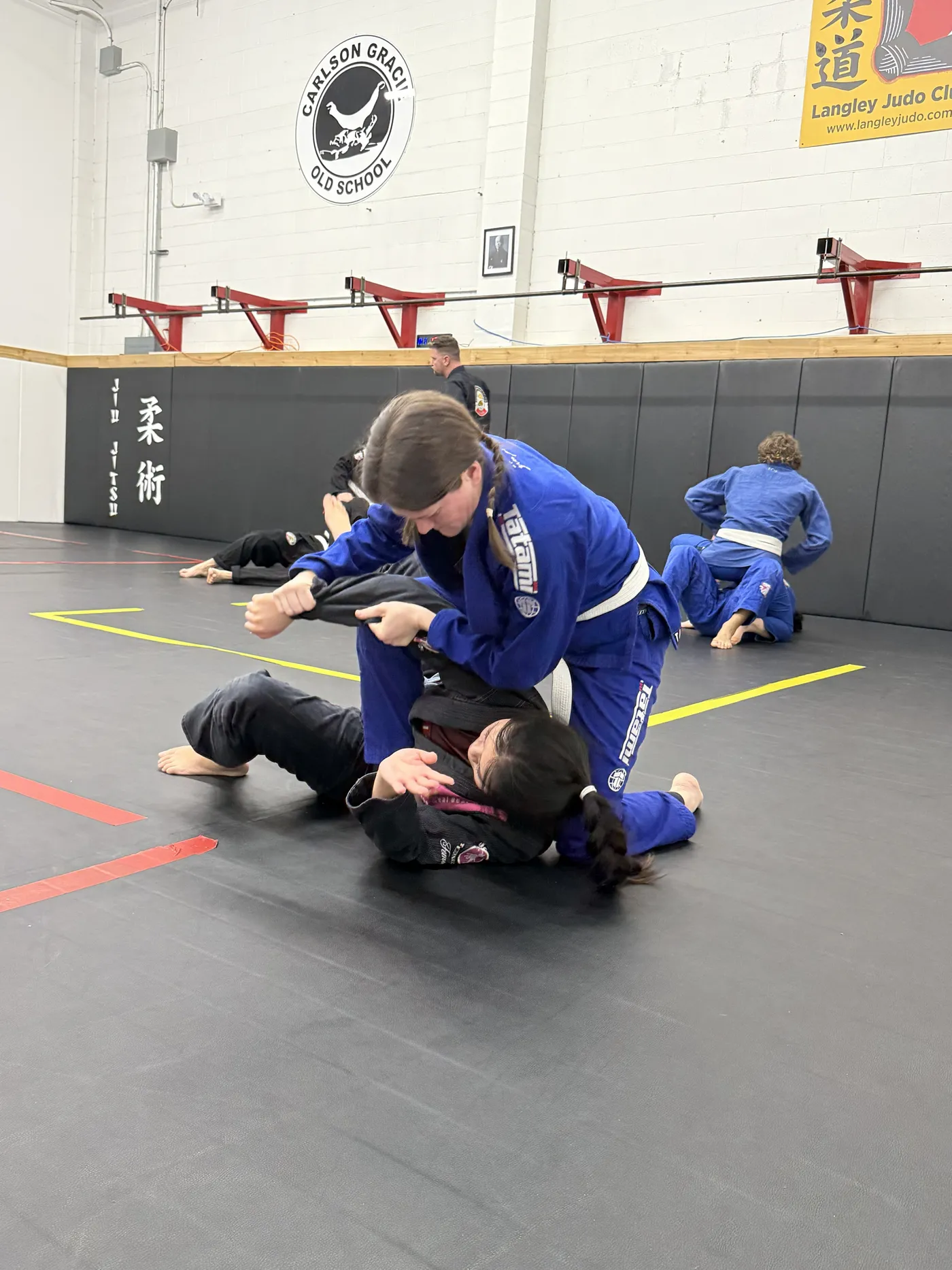 Young students rolling during a kids class in Langley