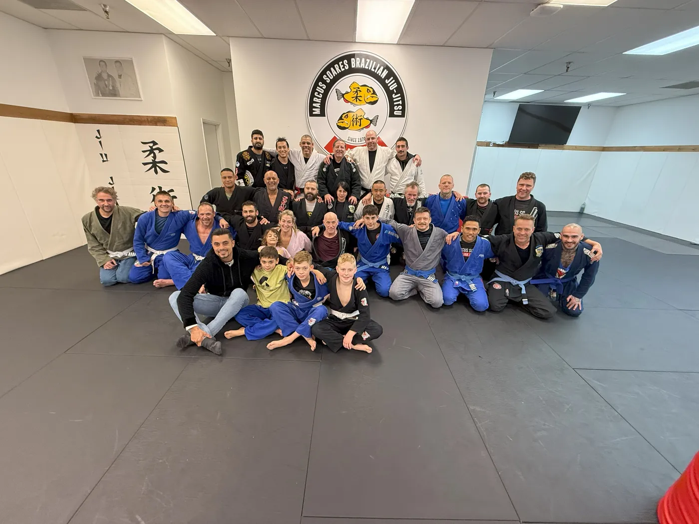 Adults and kids together for a group photo at the Maple Ridge academy