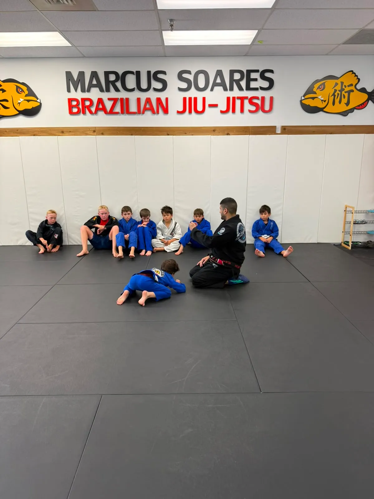 Kids Brazilian Jiu-Jitsu class on the mats in Maple Ridge