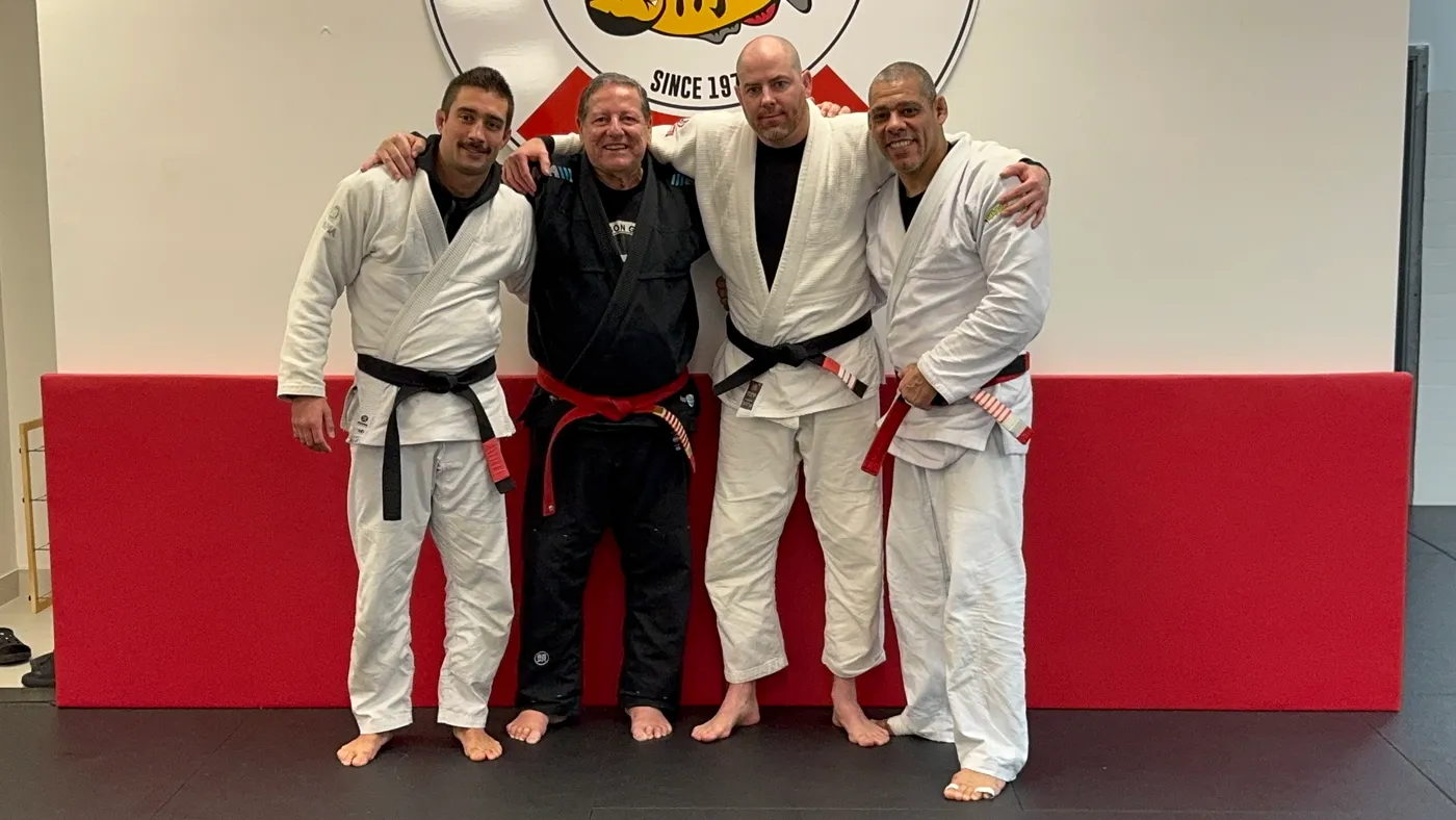 Marcus Soares with students after a belt promotion in Maple Ridge