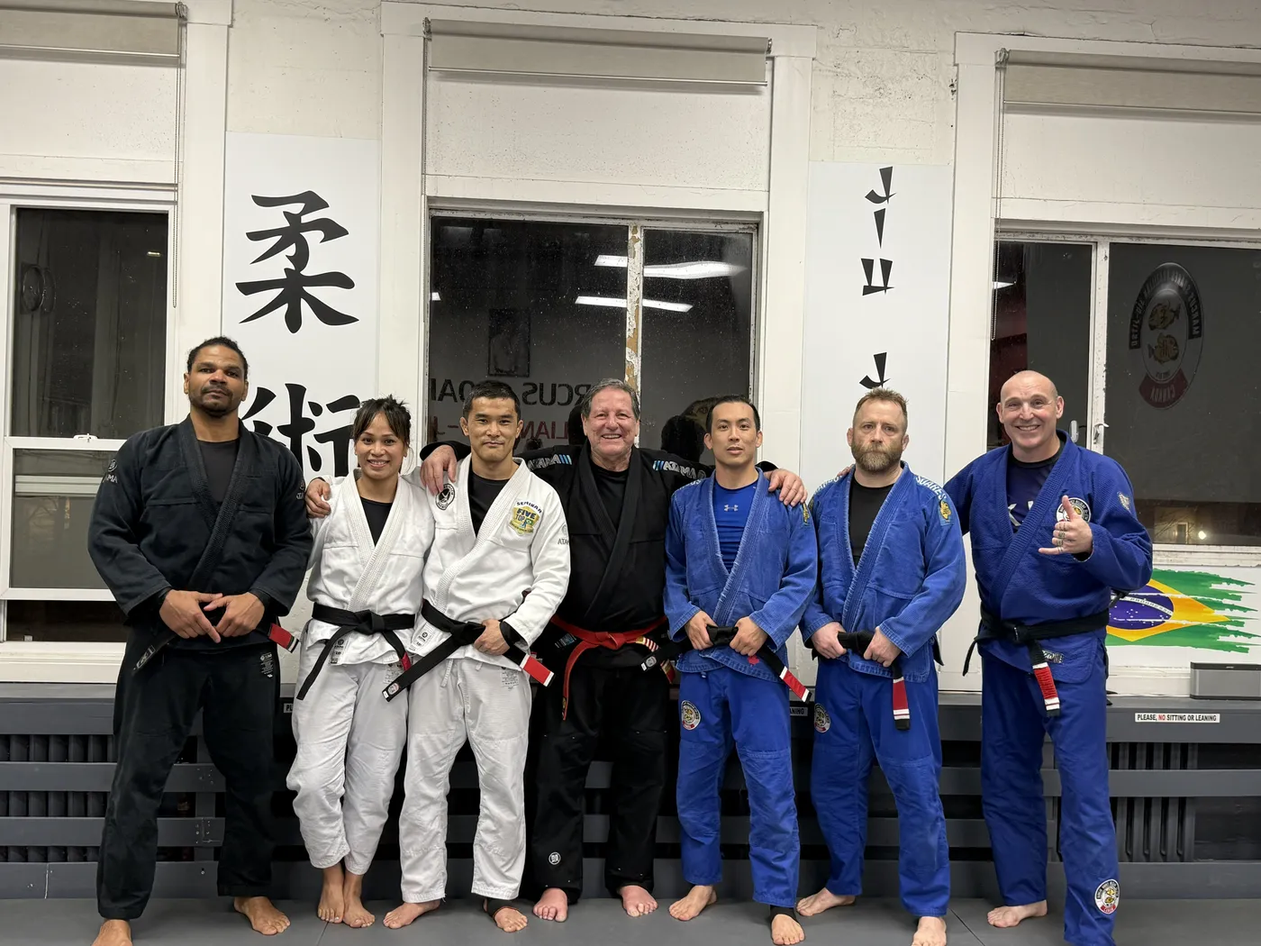 Students and instructors on the mats at the Vancouver academy